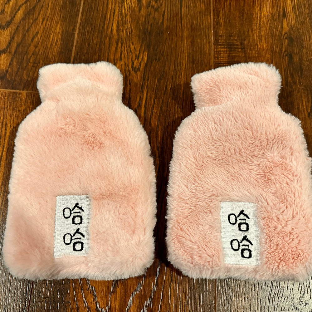 Two hot water bag with Chinese character of ‘Ha Ha’